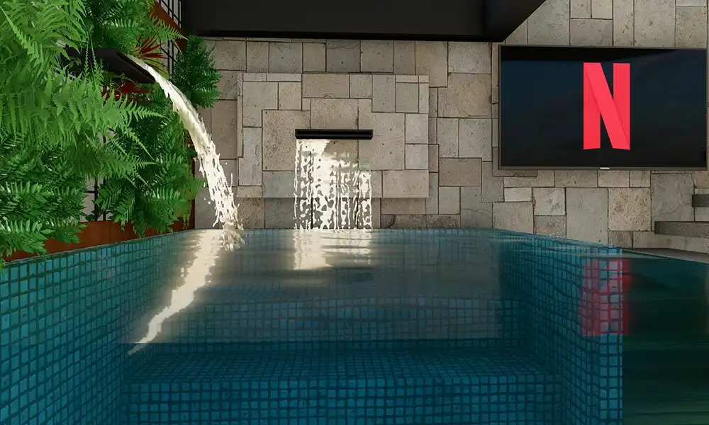 Piscina indoor com cascata