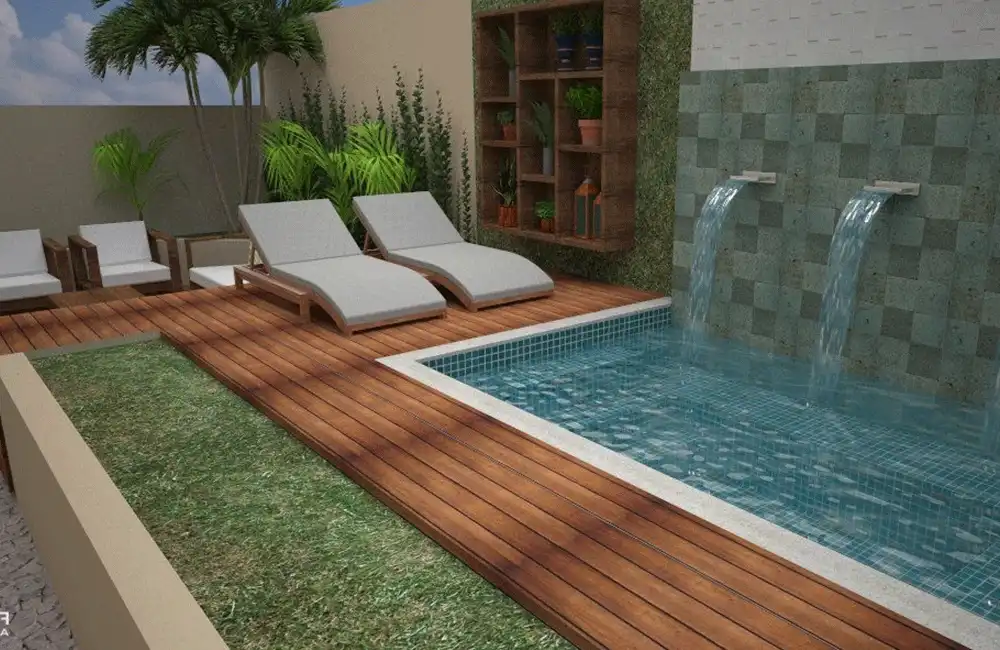 Piscina com deck e cascata