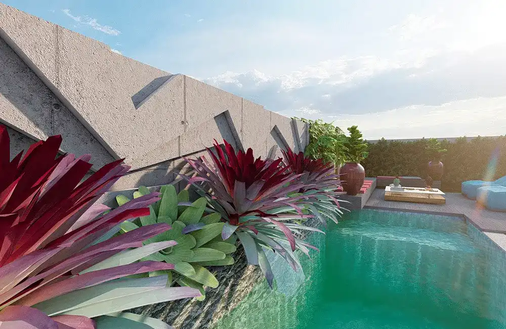 parede com bromélias e esculturas de concreto na frente da piscina