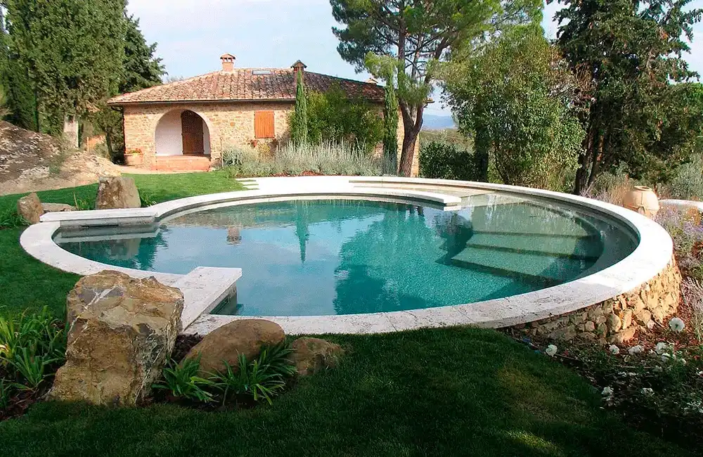 Piscina Redonda: Dicas, Vantagens +40 Fotos para Inspirar 82 Piscina redonda com prainha