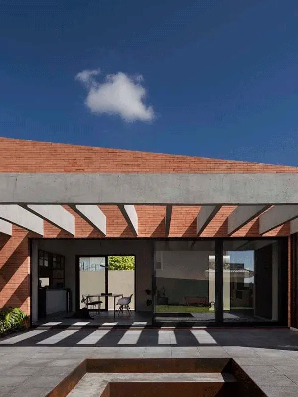 pergola com parede de tijolinho