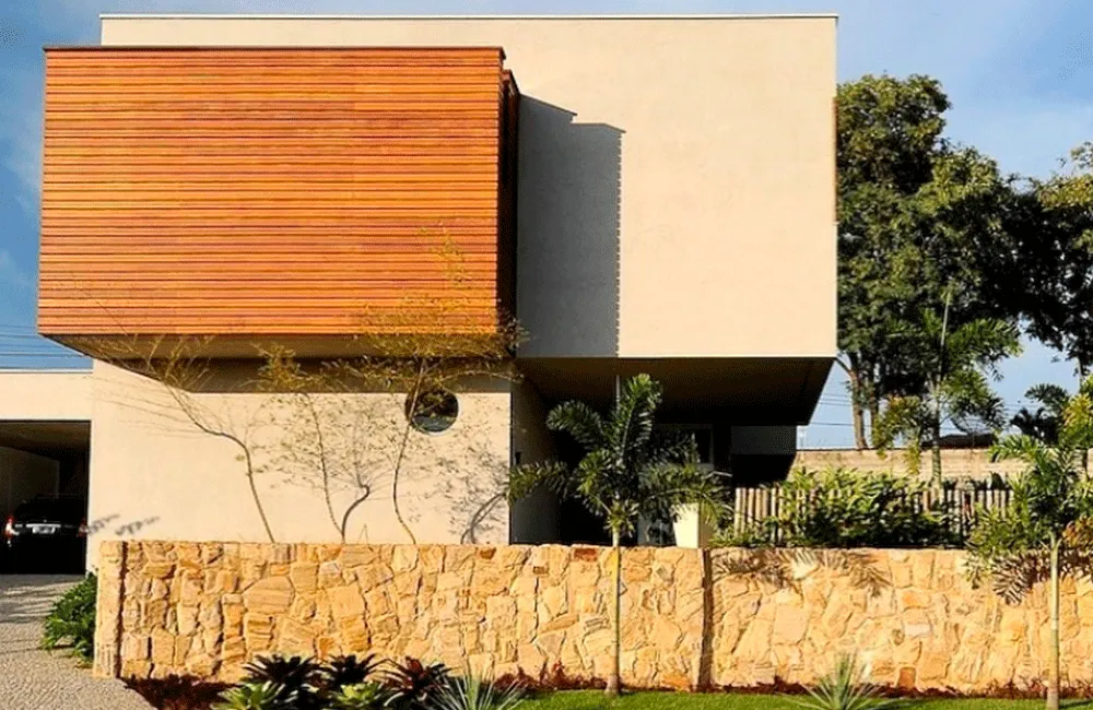 projetos com pedra madeira e painel ripado