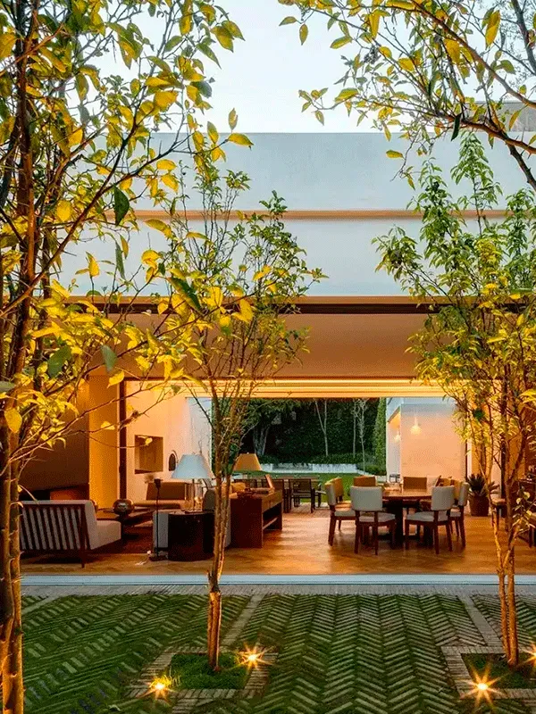 Concregrama na área de lazer moderna com arvores e plantas