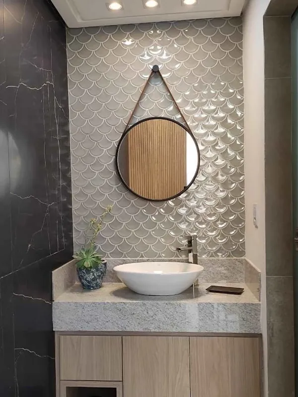 ambientes interno bem revestido com detaque de espelhos