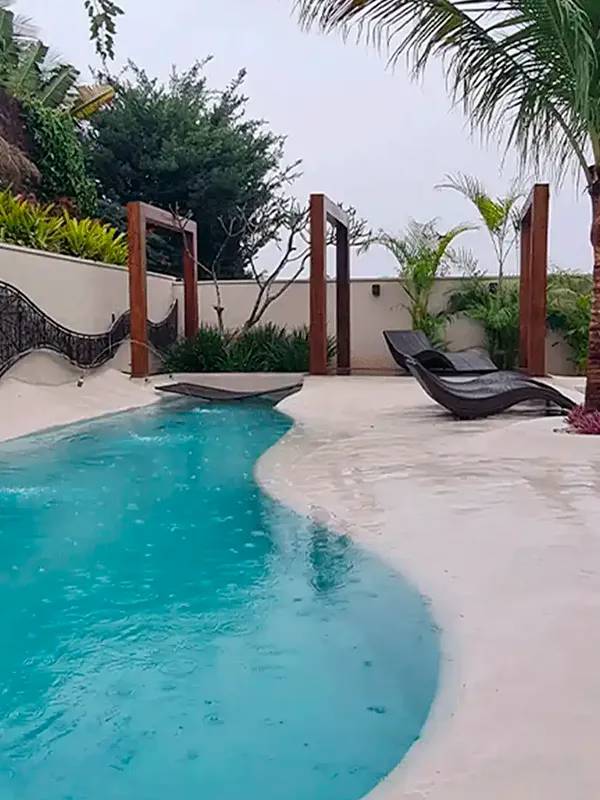 casa com piscina de areia