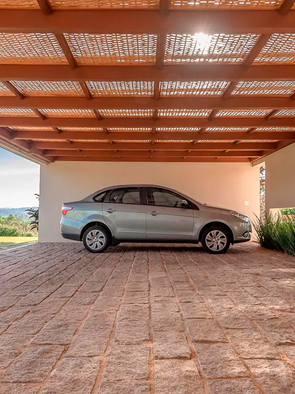 pergolaod garagem com piso de pedra
