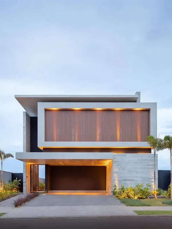 casa de luxo com decoração clean e uma garagem com piso cinza