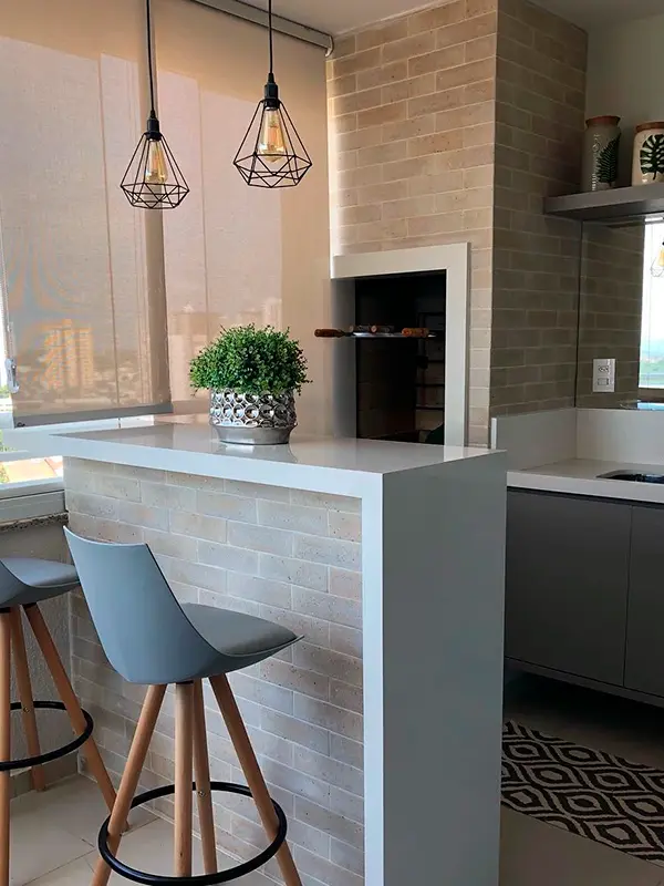 varanda gourmet com churrasqueira de tijolinho