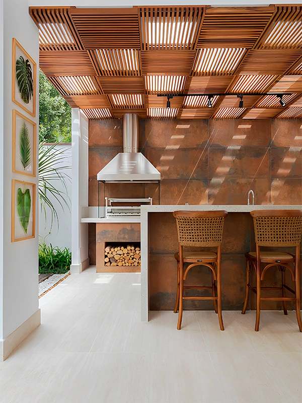 área de churrasqueira com porcelanato de acabamento fosco aplicado no piso e bancada