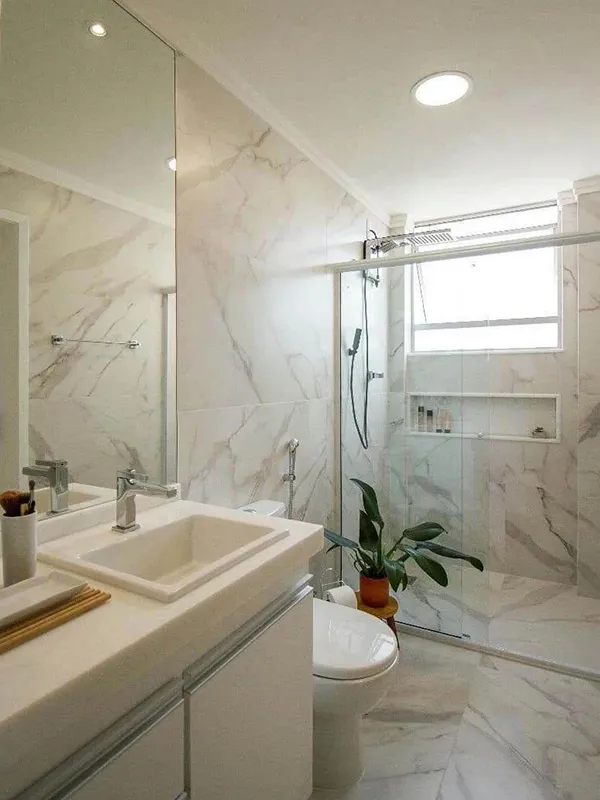 banheiro com marmore carrara