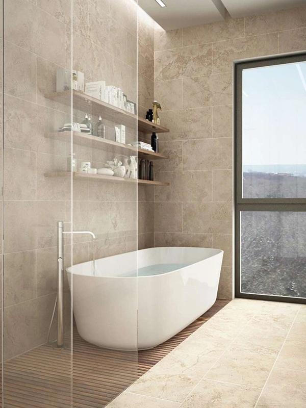 ambiente planejado feito por arquiteto, nessa foto tem um banheiro com banheira com revestimento de porcelanato travertino