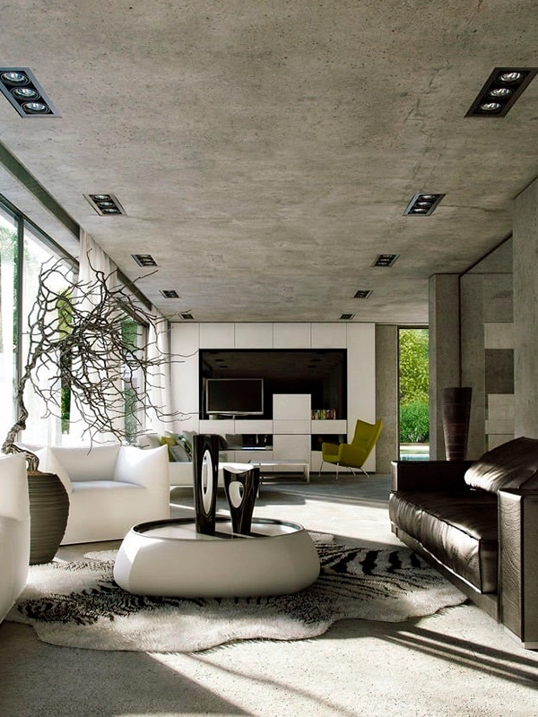 Uma moderna sala de estar com móveis brancos e paredes de concreto.