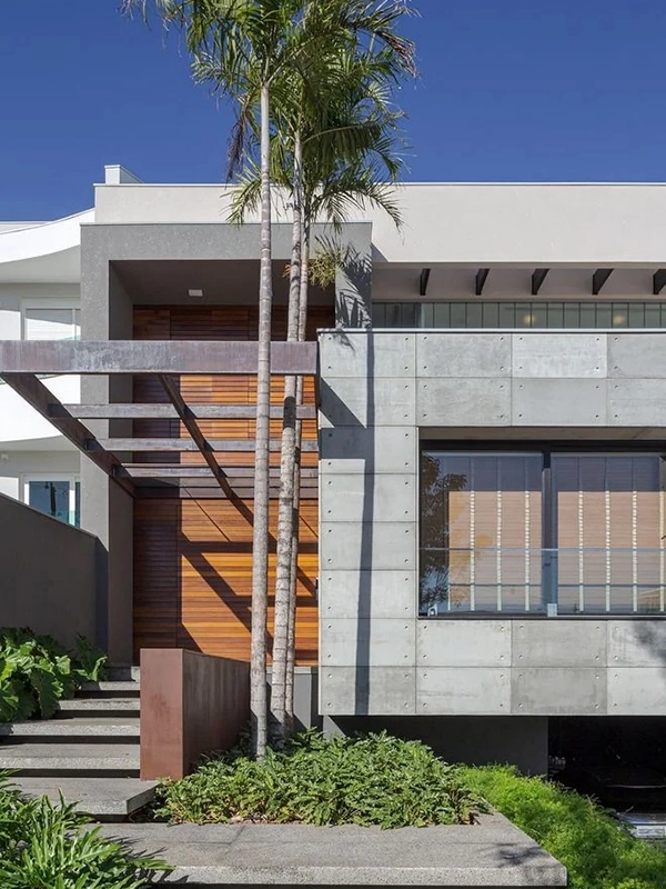uma casa com projeto exclusivo, com pergolado na fachada