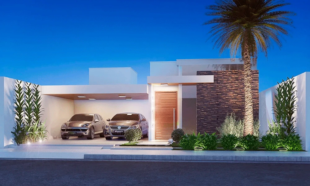 Exterior de casa moderna com telhado plano, parede de pedra, dois carros estacionados em porcelanato para garagem em uma entrada coberta, porta de entrada grande, paisagismo e uma palmeira alta ao anoitecer.